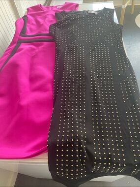 2 Calvin Klein knit dresses. Size 4. 1 Fuchsia and 1 Black. Great condition.